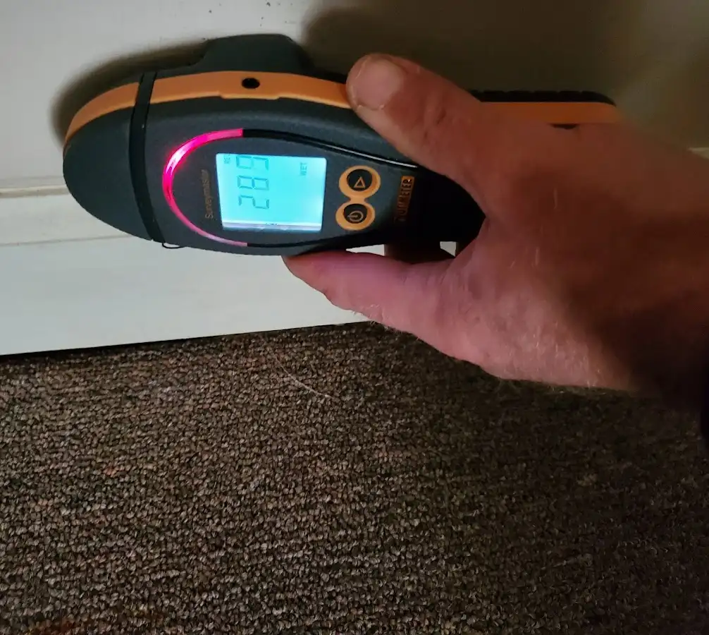 Moisture detection at baseboard during Burst Pipe Cleanup in Mount Hood Villages